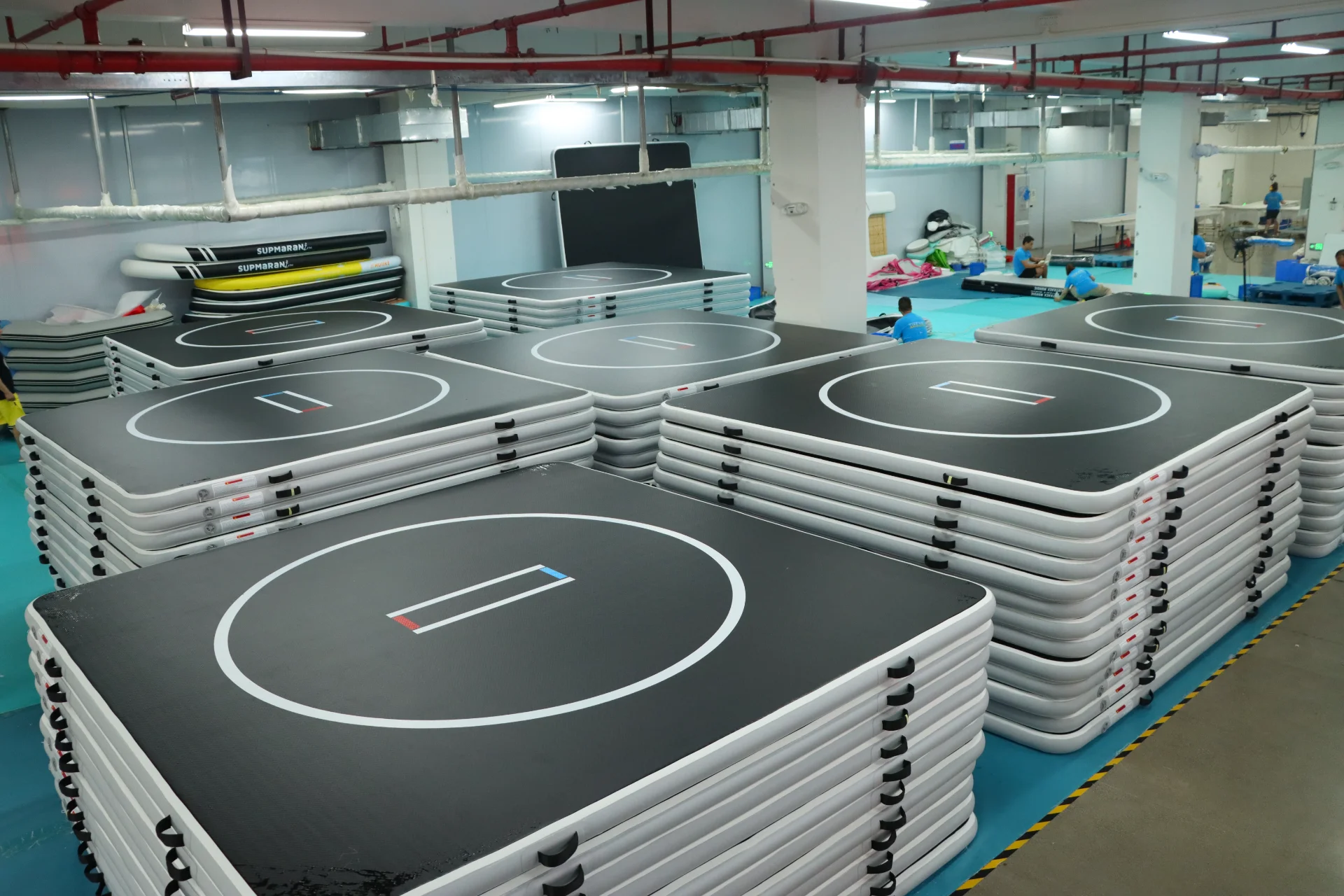 Inflatable mats stored for wholesale packing and shipment