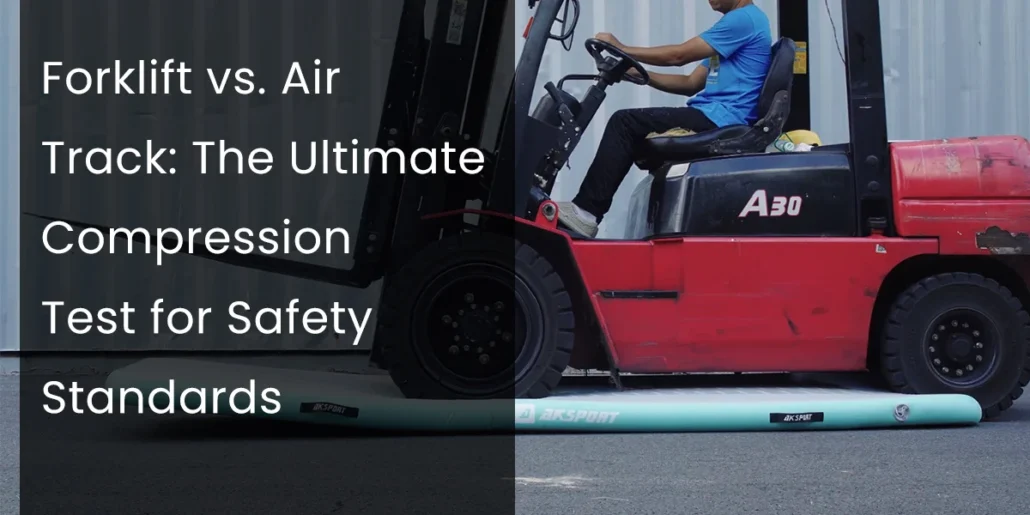 A red forklift compressing an air track during a safety test, with a driver in a blue shirt operating it.