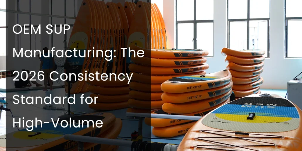 Warehouse with stacks of orange paddle boards under large windows, highlighting OEM SUP manufacturing and 2026 consistency standards.