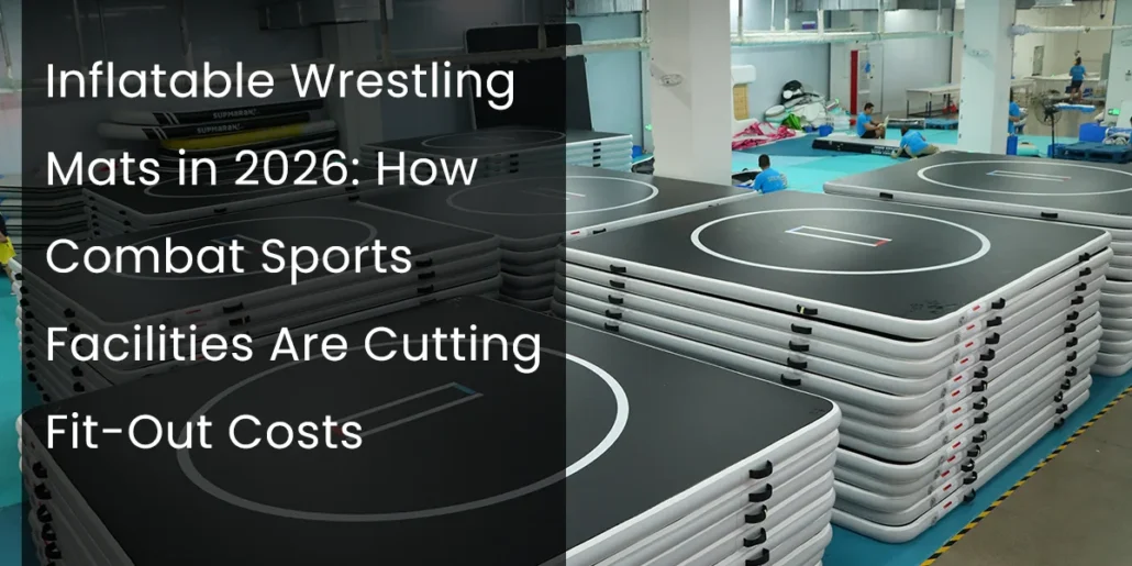 Stacks of inflatable wrestling mats in a sports facility with workers visible in the background, highlighting cost-cutting strategies for 2026.