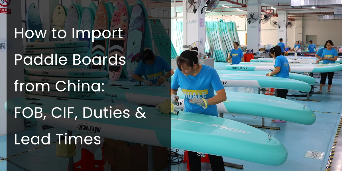 Factory workers assembling paddle boards in a production line, with stacks of paddle boards and equipment visible.
