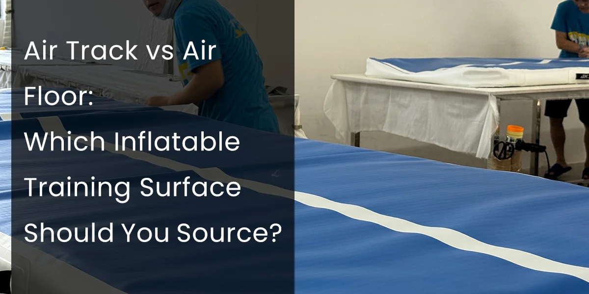 Two technicians preparing and assembling blue inflatable air tracks for training purposes at a facility.