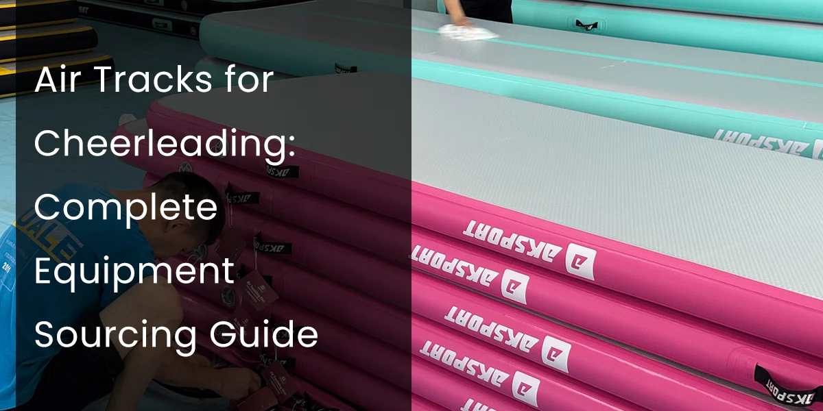 Stacked pink and teal air tracks for cheerleading with a person inspecting the equipment in a brightly lit indoor space.
