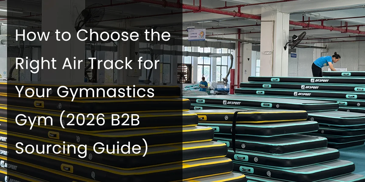 Stacked gymnastic air tracks in a manufacturing setting, with a worker inspecting products in the background.