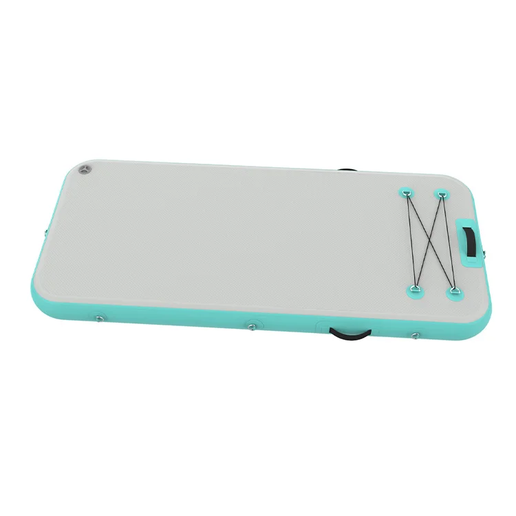 Turquoise and white rectangle inflatable floating platform with attachment points, bungee cords, and handles.