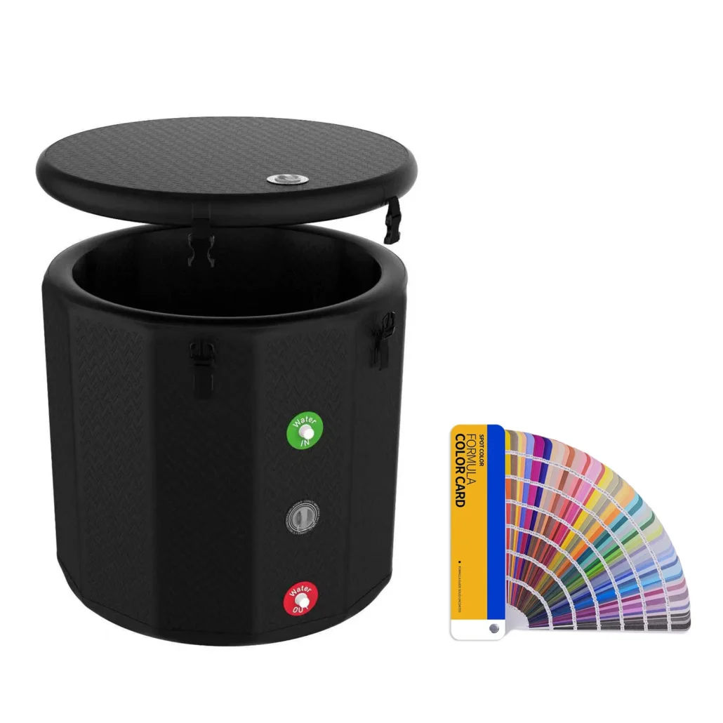 Round black hot tub with an open lid and color sample fan card on the side.