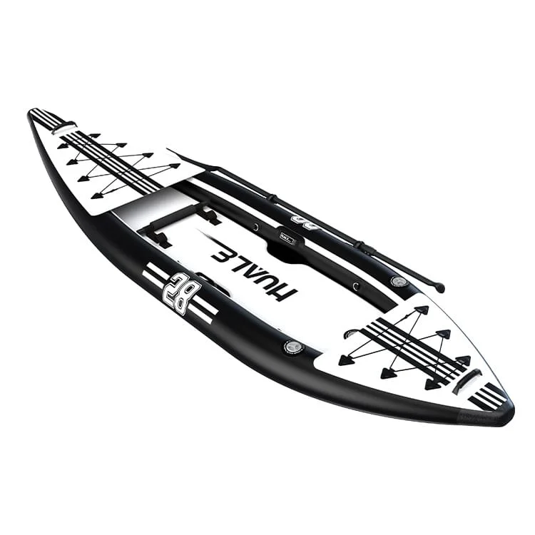 Modern inflatable kayak in black and white with graphic details, secure storage straps, and sturdy structure on a white background.