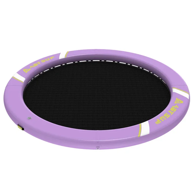 Purple inflatable water trampoline with a black jumping surface, designed for recreational use on water.